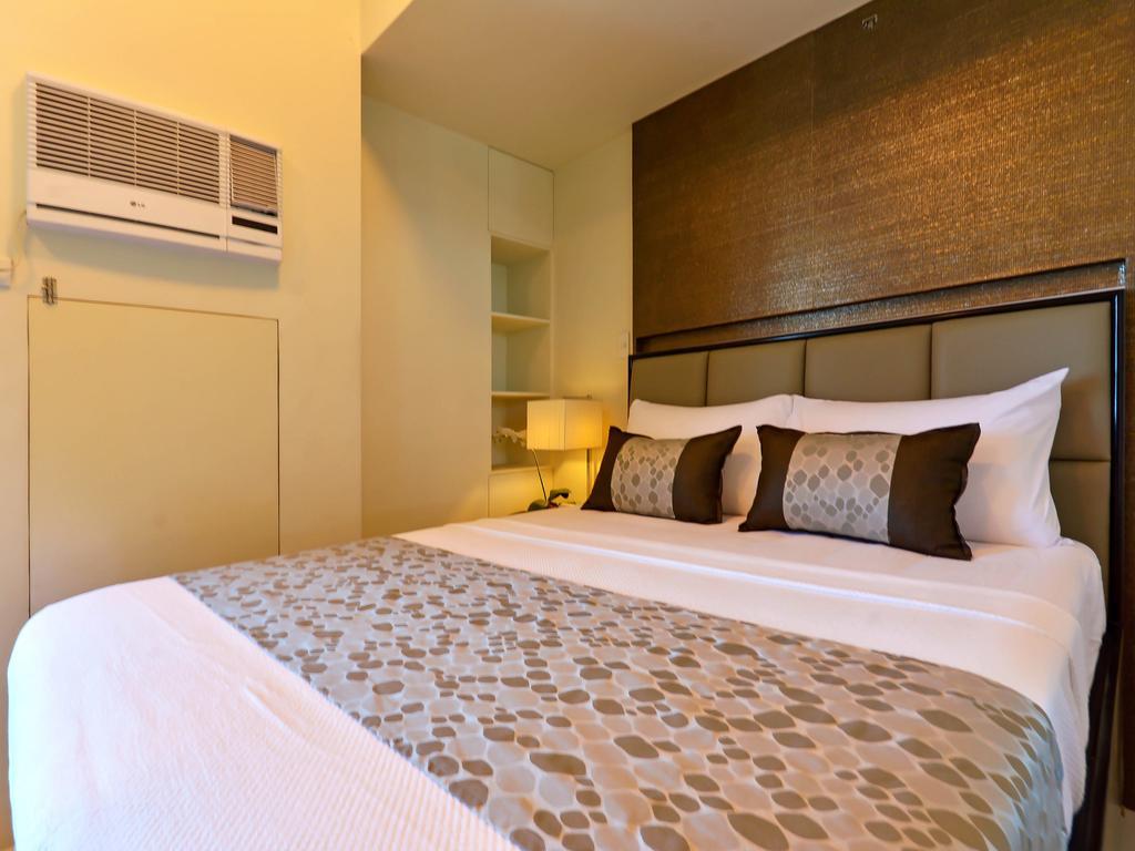 Currency Serviced Suites Manila Exterior photo